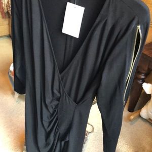 Cache back mock wrap dress with zipper sleeves!
